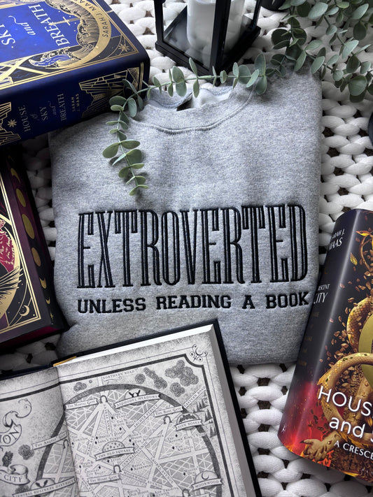 Extroverted Unless Reading A Book Embroidered Sweatshirt
