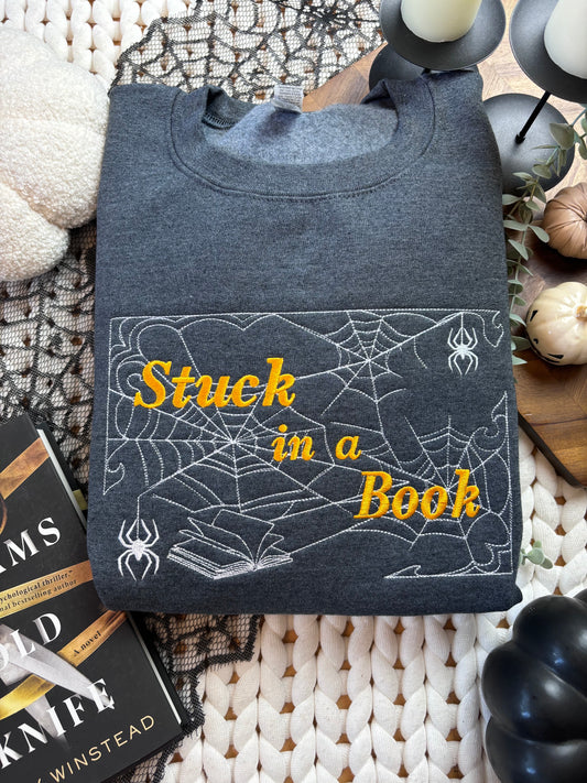 Stuck In A Book Embroidered Sweatshirt